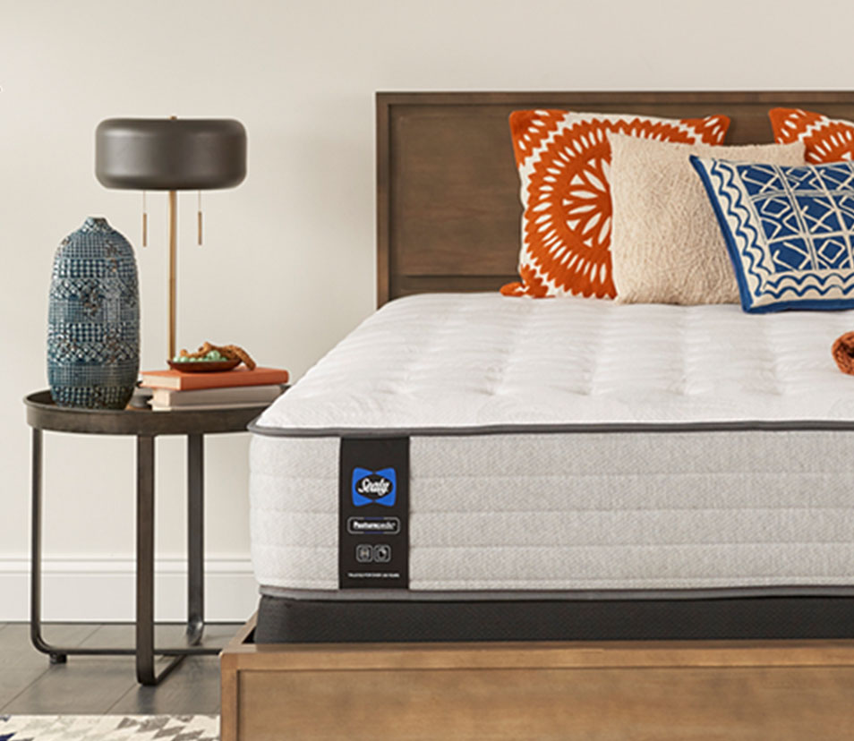 Sealy Hybrid Posturepedic® bed in styled bedroom